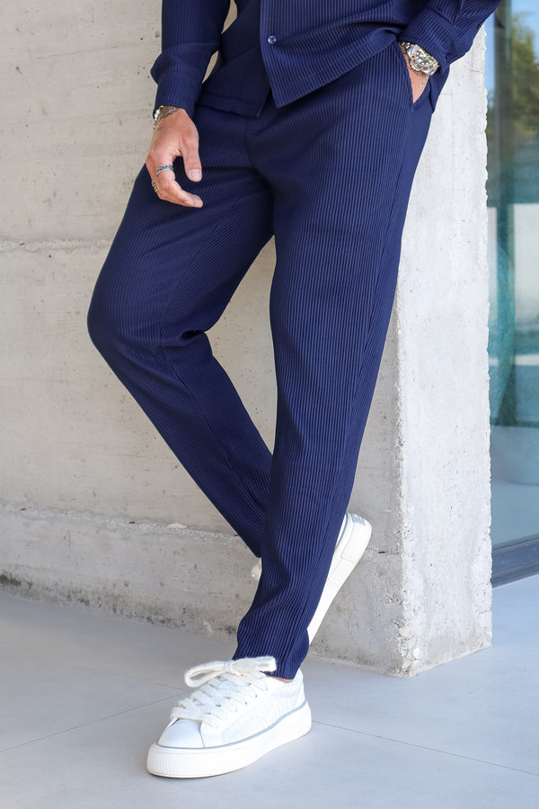 THE ICON. X ROSS CAMPBELL PLEATED TROUSERS - NAVY BLUE